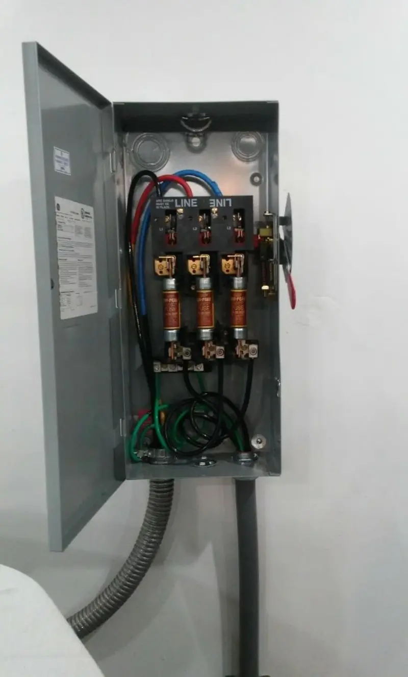 Three-phase disconnect switch installed for Smoke Detector Installation in Lenoir